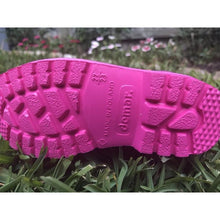 Load image into Gallery viewer, The sole of a pair of Kids Dino Welly Boots in Pink. Comfortable, lightweight and durable. Available to buy from Bright Light Boots