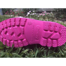 Load image into Gallery viewer, The sole of a pair of Kids Dino Welly Boots in Pink. Comfortable, lightweight and durable. Available to buy from Bright Light Boots
